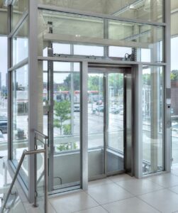 Savaria Orion LULA Commercial Elevator with custom glass hoistway